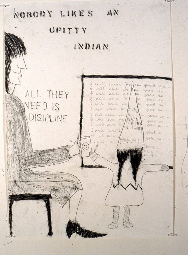 A teacher watches a student write lines on a board