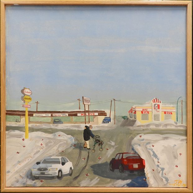 Moose Jaw intersection with snow melting to reveal litter