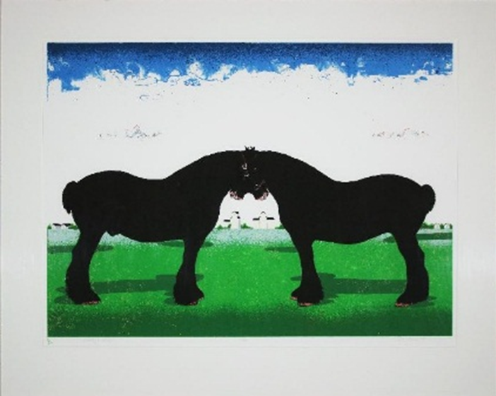 Two horses facing each other in a field