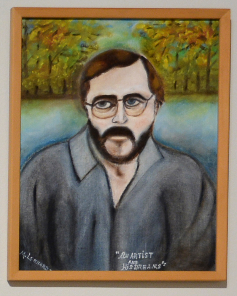Portrait of a man with a mustache.