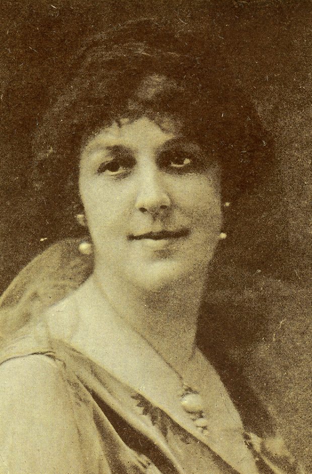 Black and white headshot of Mrs. Norman Beal wearing gown and fancy jewellery.