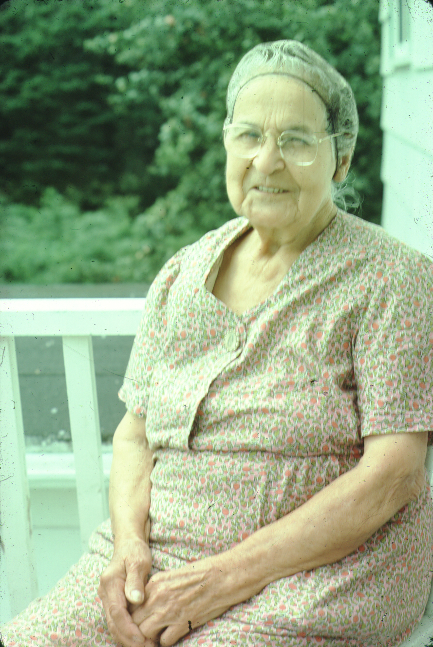 Mrs Phillips, an elderly Mi'kmaq lady, seated