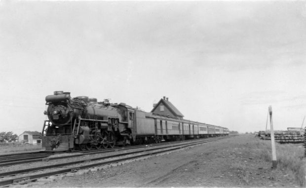Steam train running on a railway track