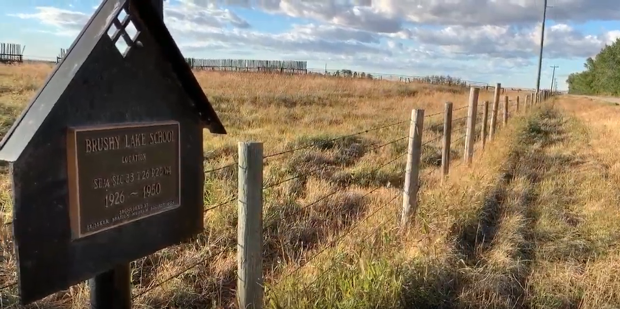 Sign marking Brushy Lake School site, 1926-1950.