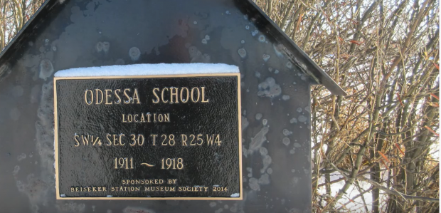 Sign marking former site of Odessa School, 1911-1918
