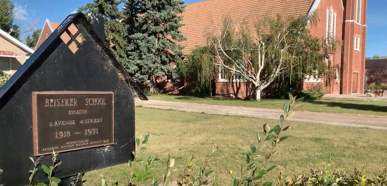 Sign marking former site of Beiseker School, 1918-1951, on what is now the Catholic Church