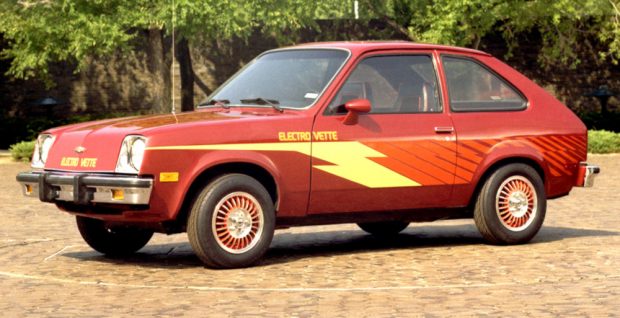 Colour photograph of an electric car painted in stylized lightning-bolt patterns. Writing on the door reads “Electrovette”