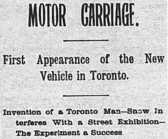 A newspaper headline. Text reads "MOTOR CARRIAGE. First appearance of the New Vehicle in Toronto. Invention of a Toronto Man- Snow Interferes with a Street Exhibition- The Experiment a Success."