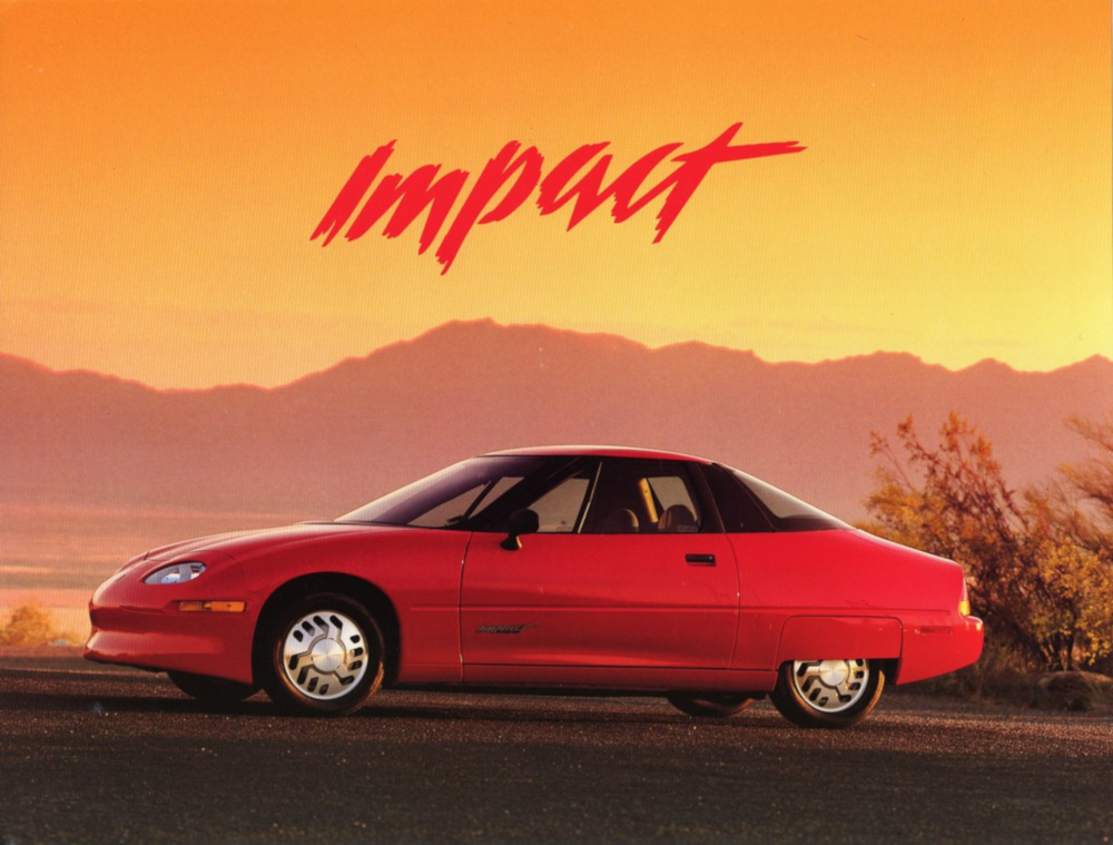 Colour photograph of a sleek electric car in a desert environment. A title in stylized font reads “Impact”
