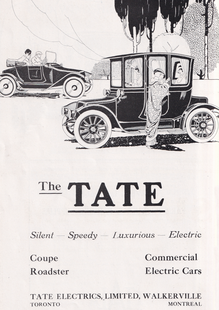 Advertising image showing three well-dressed young women gathered around an electric car in an outdoor environment, with two young men arriving in an electric sports car in the background. Headline reads “The TATE / Silent - Speedy - Luxurious - Electric”