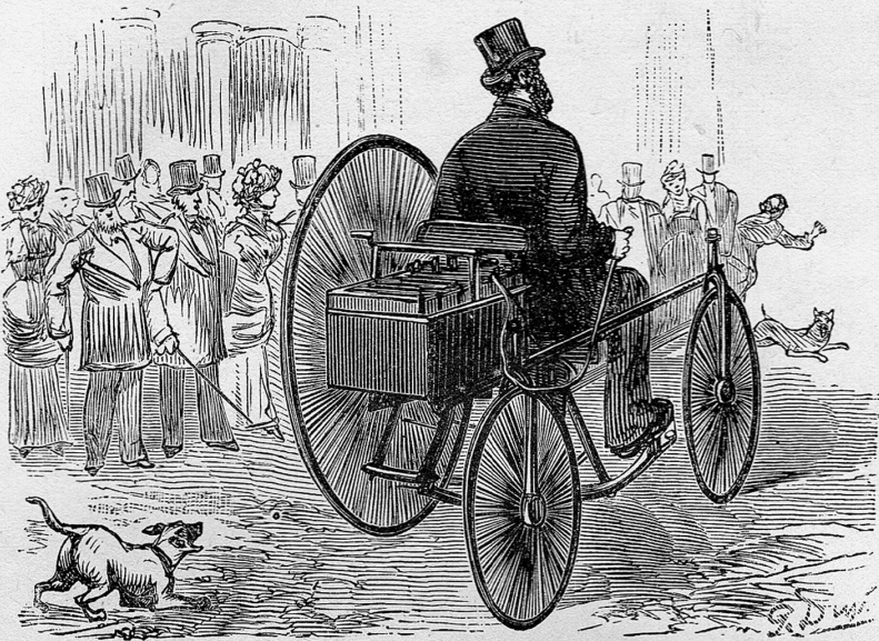 Woodcut of a shocked crowd watching a man in a coat and top hat drive a three-wheeled electric vehicle along a cobbled street, chased by several barking dogs.