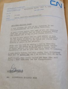 Colour photograph of a memo that has been typed on a typewriter. There is a header with the 