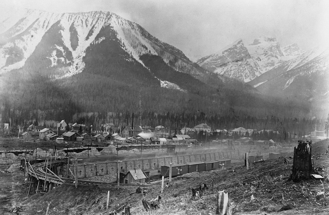 Coke ovens with the townsite of Fernie behind them. Mount Fernie is in the background.