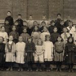 Fernie Public School with teacher and 32 students, ca 1915.