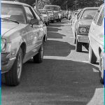 A line of cars heading towards the Fêtes du Vieux Saint-Eustache