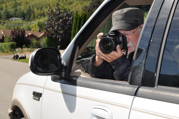 A photographer shooting from his SUV.
