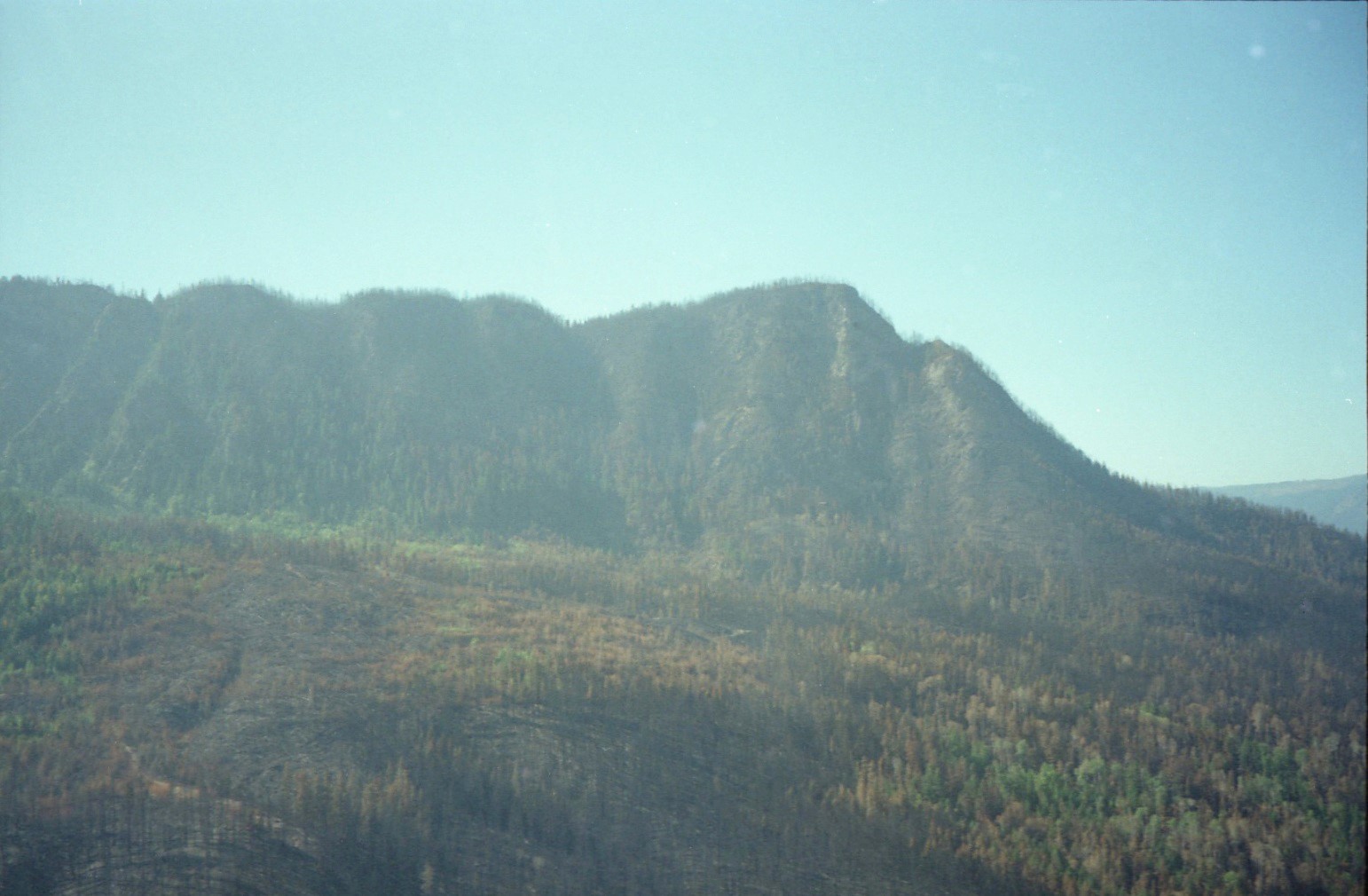 View of mountain after forest fire is out.