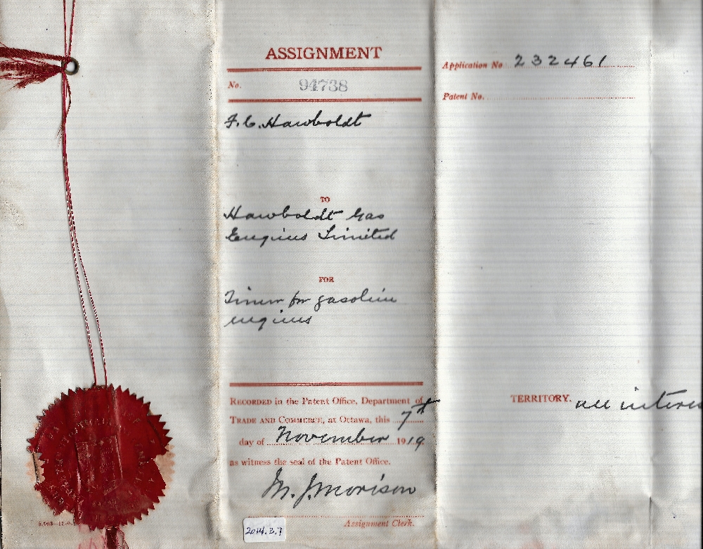 A colour scan of the patent for the timer for the gasoline engine issued to Forman Hawboldt, and transferred to Hawboldt Industries Ltd. November 7, 1919 . The left side has a red wax seal and ribbon.