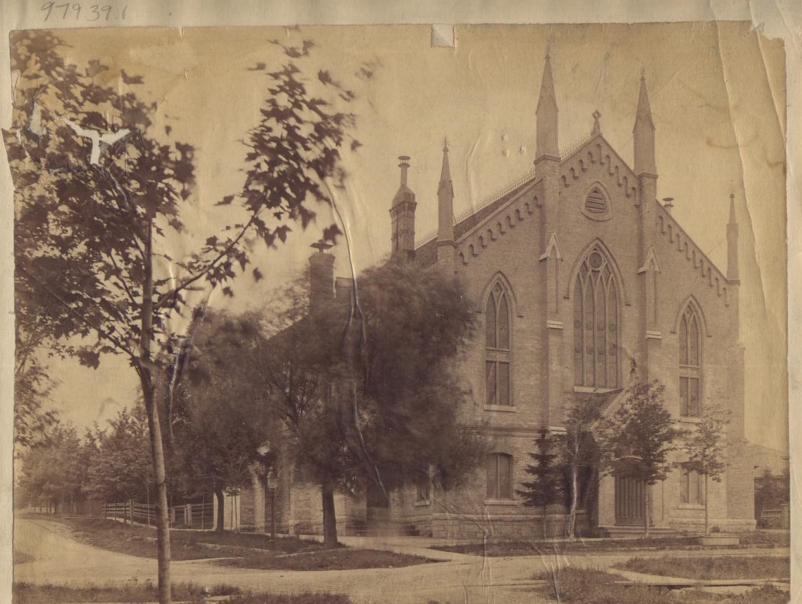 Front facade of stone church building.