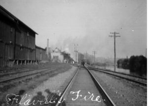 View of burning building from afar.