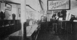 Black and white photograph of boy's clothing.