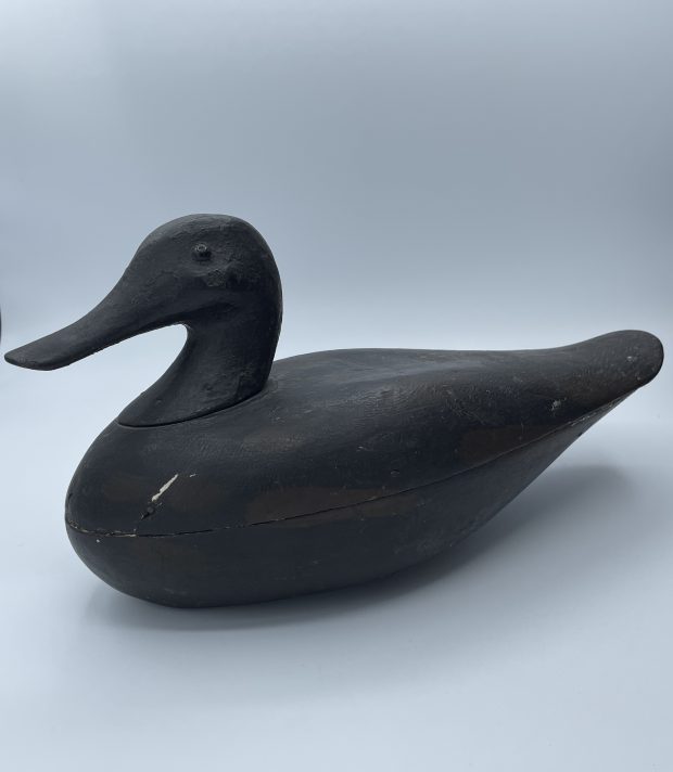 Black wooden duck.