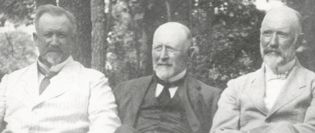 Black and white photo circa 1910 of Lindsay William, John Dundas (J. D.), and Joseph Flavelle.