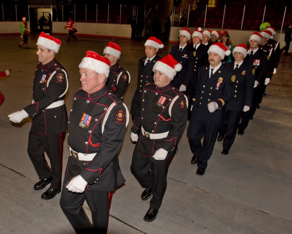 Honour Guard lead a march of uniformed members at Kids Christmas Party 2015