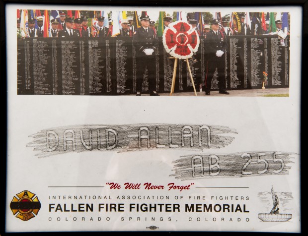 Rubbing of the IAFF Memorial wall, 'David Allan AB-25' with image of the memorial wall above.