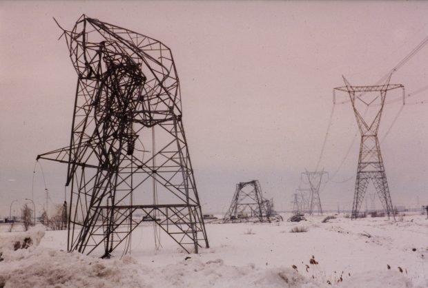 The electrical towers curled in upon themselves under the weight of the ice on their structure.