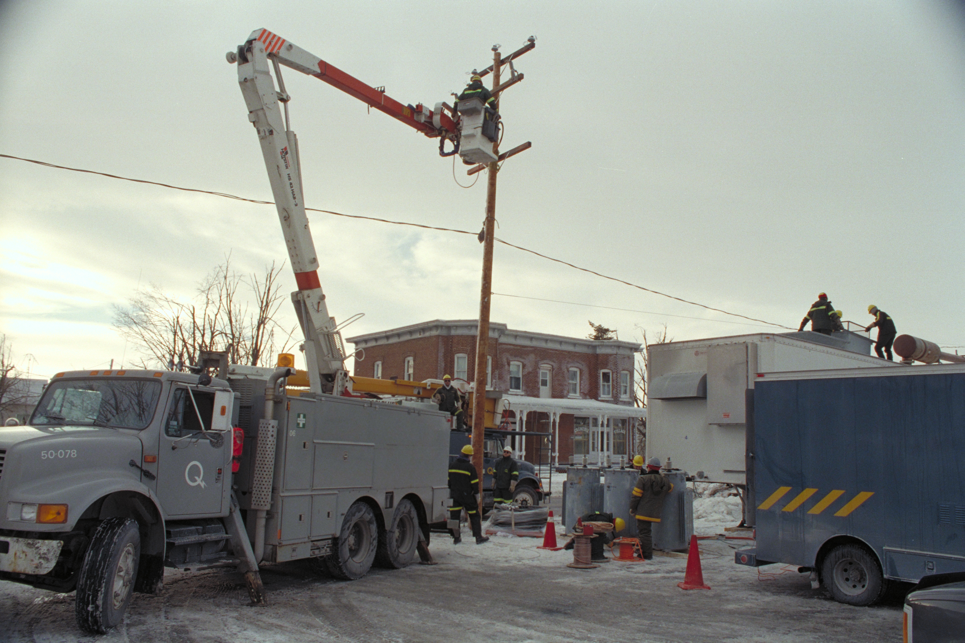 Team of electricians - checking the state of the grid.