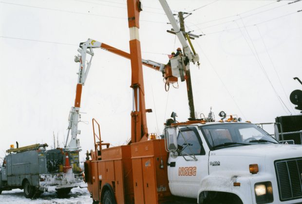 American and Canadian electric companies working side by side to restore power as soon as possible.