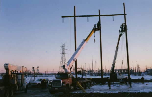 The workers working day and night to restore power.