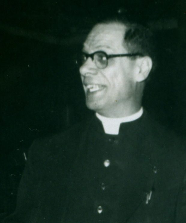 Black and white photo of a Priest, Father Morrocco facing left