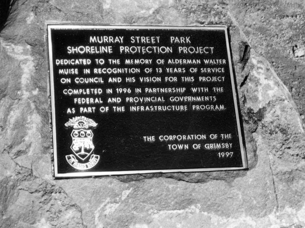 Black and white photograph of a memorial plaque titled Murray Street park shoreline protection project