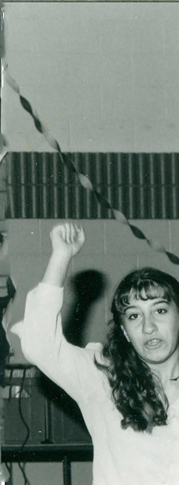 Black and white photograph of a girl dancing