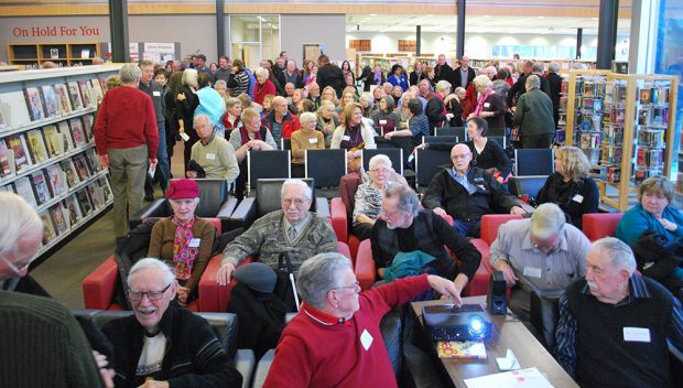 A colour picture of a large group of people at an event