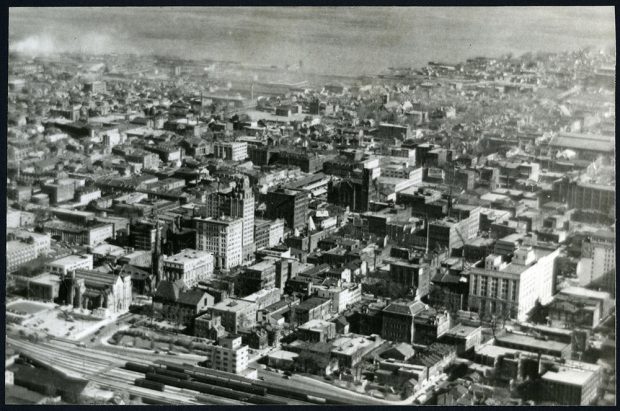 Black and white photograph of an aerial view of Hamilton's densely built centre town