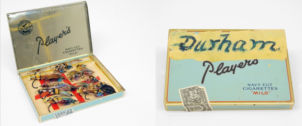 Old tin cigarette boxes use to organize and store fishing flies.