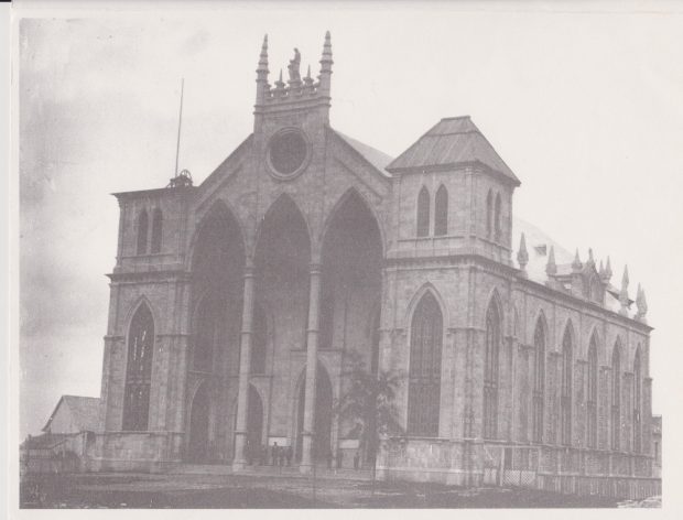 Black and white photograph of a face view of Sainte-Anne Church before the construction of the bell towers.