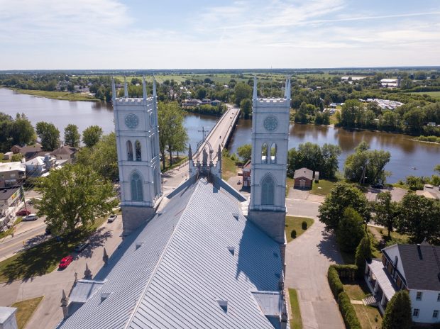 Aerial view colour photograph of Sainte-Anne Church overlooking the municipal bridge.
