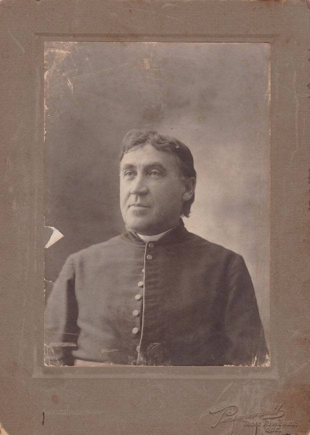Sepia color photograph of Télesphore Laflèche wearing a cassock.