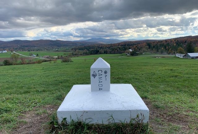 A simple marker separates Vermont from Sutton Township.