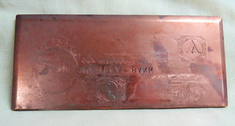 A copper plate used to print counterfeit Bank of Montréal bank notes.