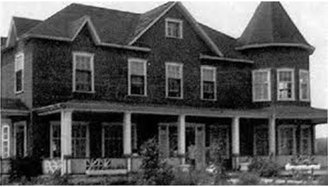 Photo of the International House, formerly the Prince Albert Hotel from 1860 to 2000, located at 66 Thibault Street S