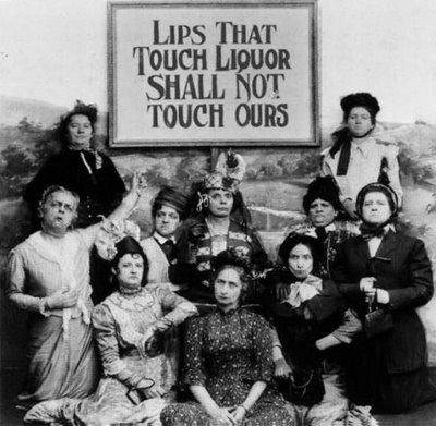 Cartoon of a group of women with a banner that reads: Lips that Touch Liquor Shall not Touch Ours.