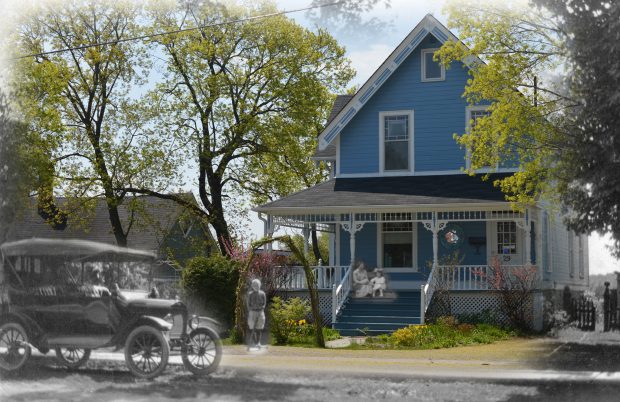 A black and white photograph of an automobile superimposed on a modern photograph of a bed & breakfast.