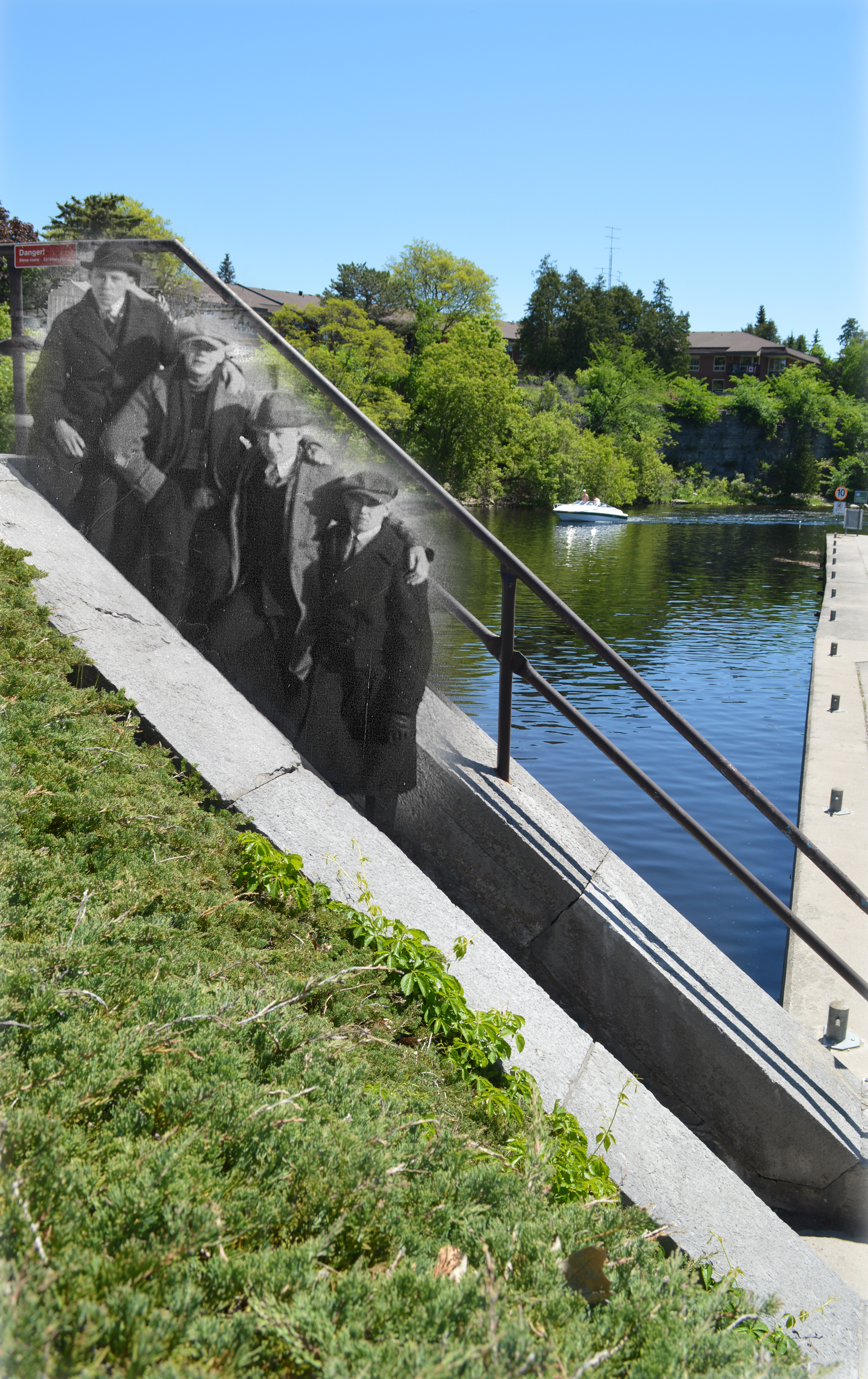 A B&W photograph of four men standing on lock stairs superimposed on a contemporary image of the river.