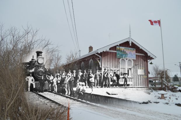 A B&W photograph of a train and crowd of people superimposed on a contemporary photograph of the station.