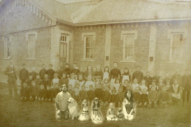 A contemporary photograph of a family superimposed on a class picture in front of a brick schoolhouse.